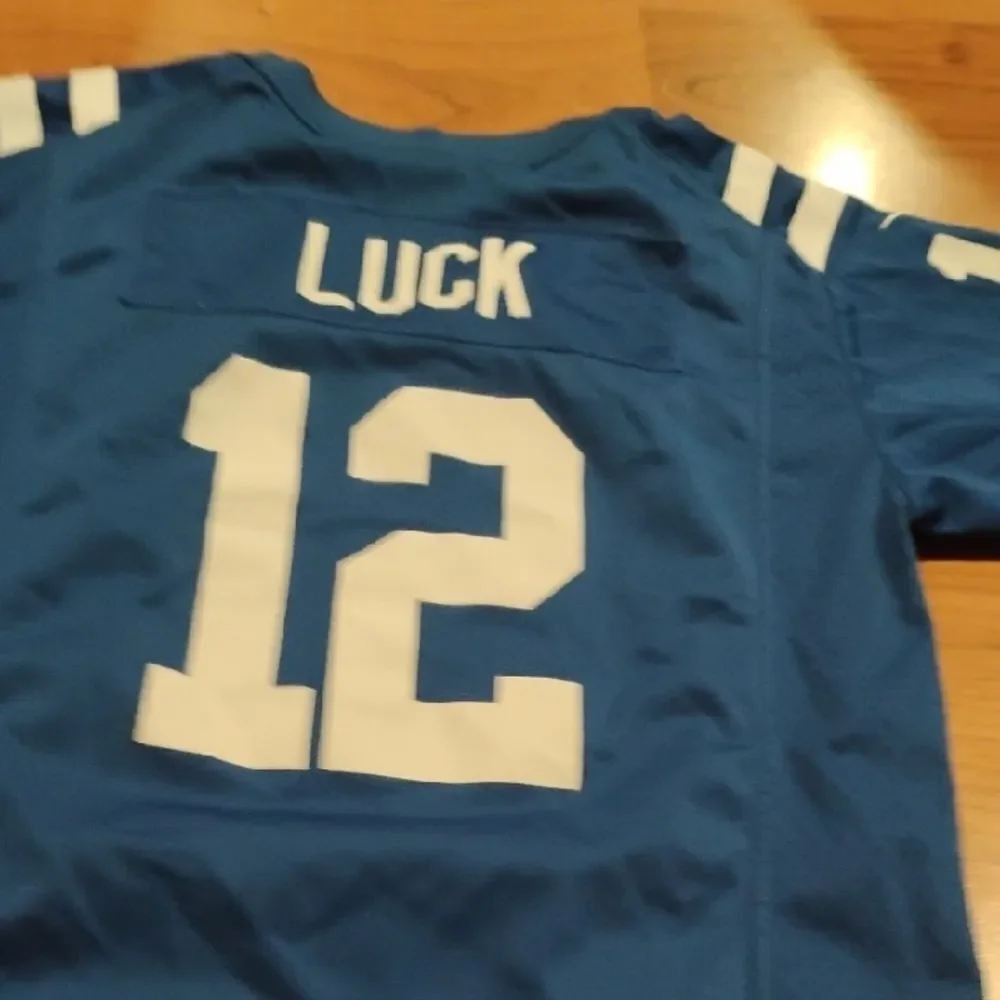 Nike Blue and White Sports Colt Jersey #12 Luck